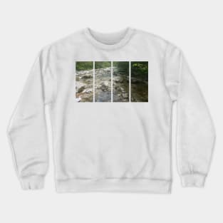 A static shot of the clear water of a mountain stream between rocks and stones; beautiful nature in a sunny day; no people around Crewneck Sweatshirt